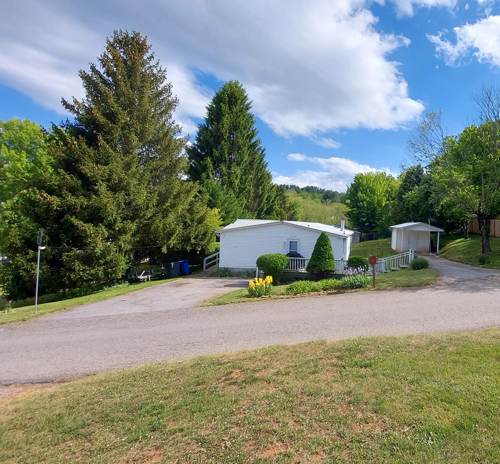 Photo of 46 Larkspur Lane, Canton, NC 28716 (MLS # 26047212)