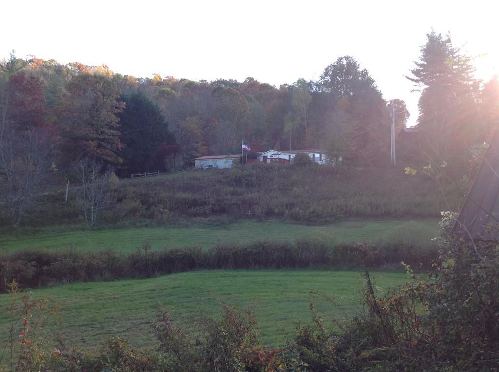 Photo of 36 Triangle Rd, Tuckasegee, NC 28783 (MLS # 26042505)