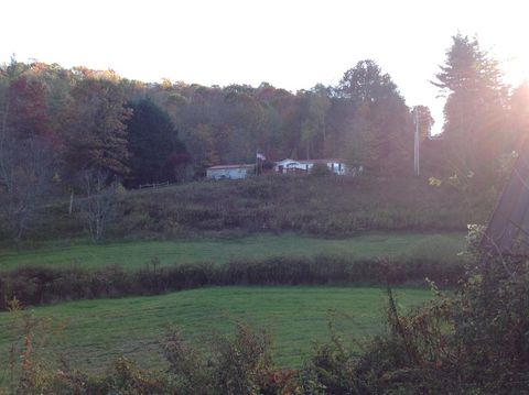 Photo of 36 Triangle Rd, Tuckasegee, NC 28783 (MLS # 26042505) Photo of 36 Triangle Rd, Tuckasegee, NC 28783 (MLS # 26042505)