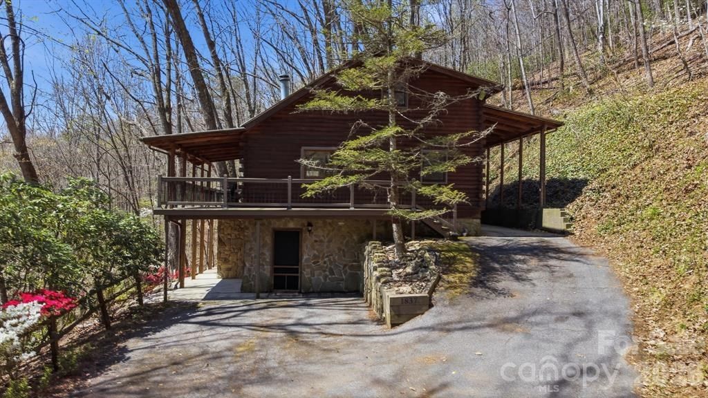 Photo of 1837 E Alarka Road, Bryson City, NC 28713 (MLS # 26046862)
