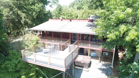 Photo of 8207 Hwy 28 N, Almond, NC 28702 (MLS # 26047812)
