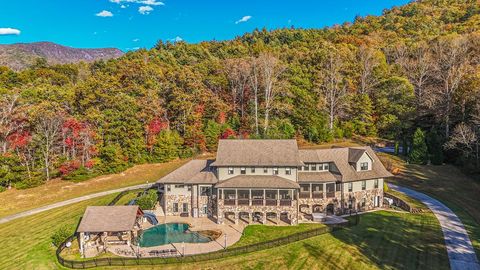 Photo of 2887 Tessentee Rd, Franklin, NC 28734 (MLS # 26042637)