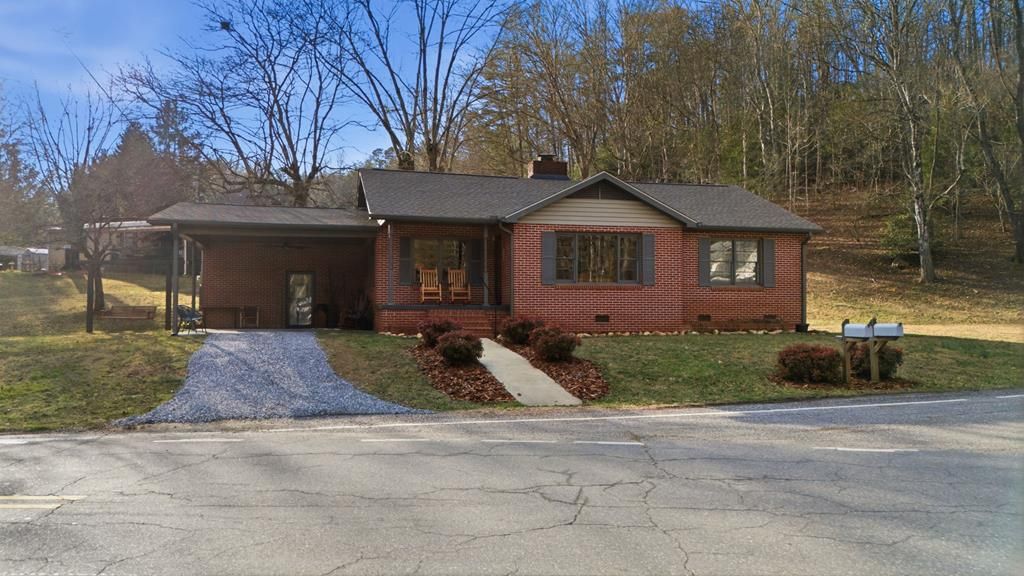 Photo of 504 Greens Creek Rd, Sylva, NC 28779 (MLS # 26045464)