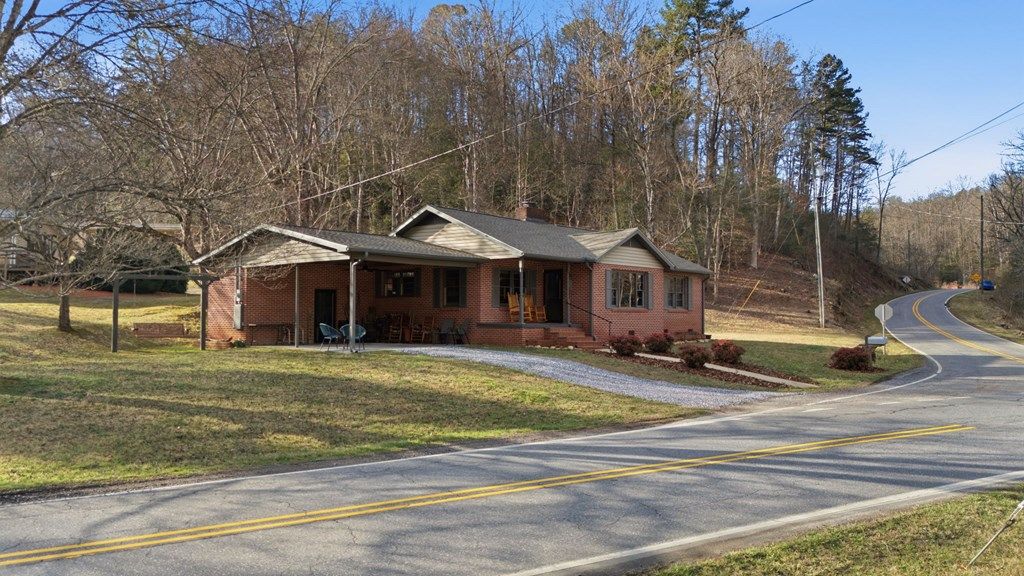 Photo of 504 Greens Creek Rd, Sylva, NC 28779 (MLS # 26045464)