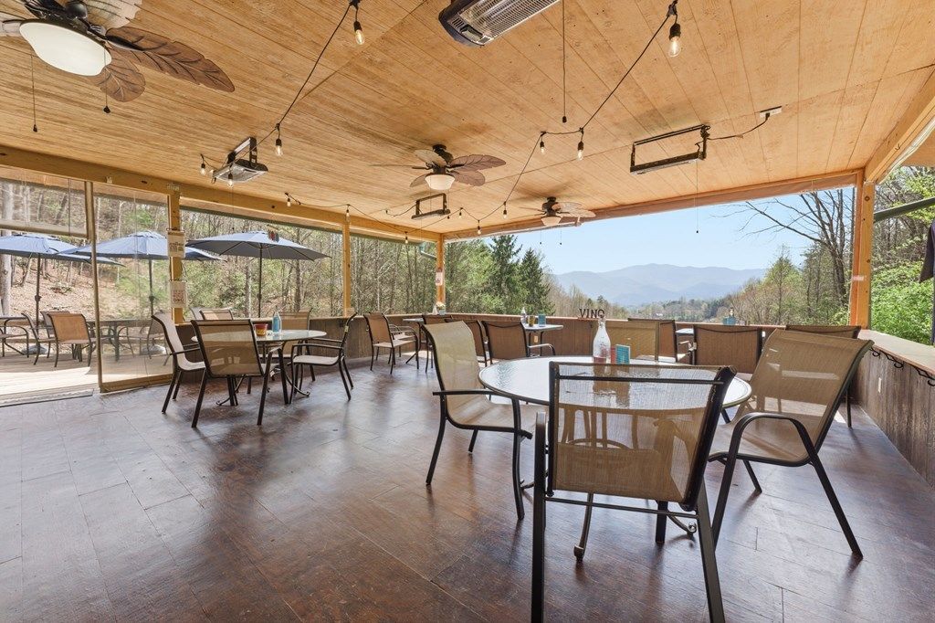 Photo of 405 Johnathan Walk Rd, Bryson City, NC 28713 (MLS # 26046816)