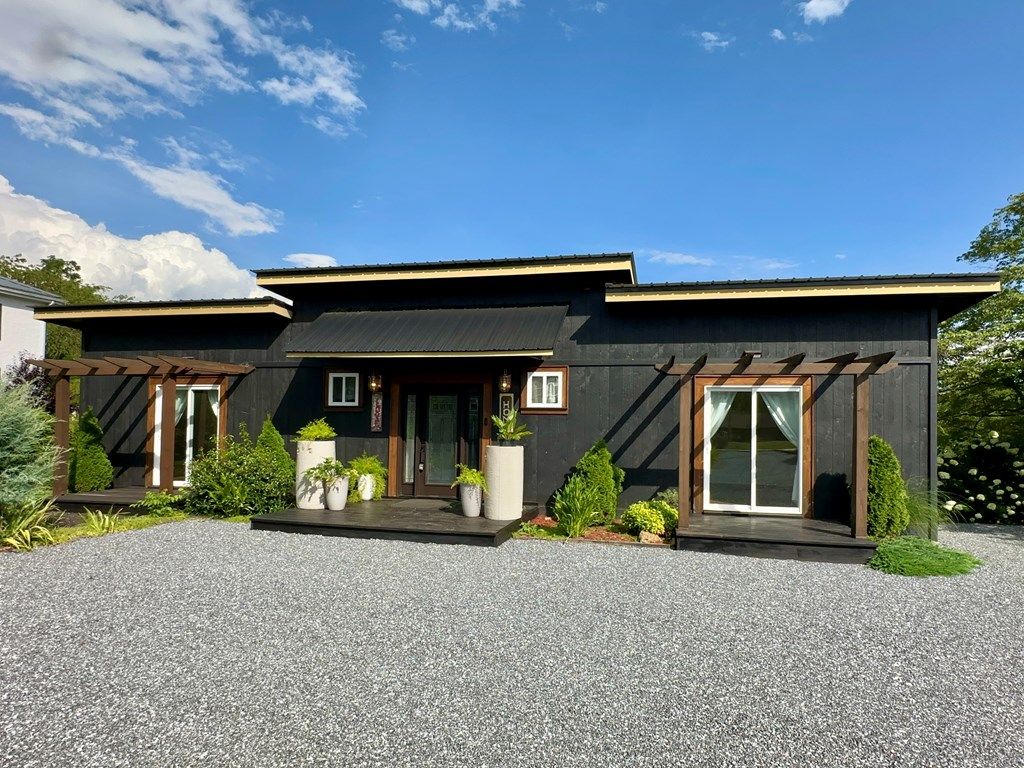 Photo of 1389 Webster Rd, Sylva, NC 28779 (MLS # 26041652)