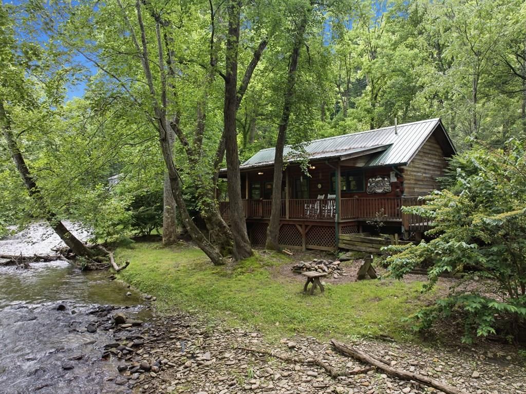 Photo of 10413 Lower Alarka Road, Bryson City, NC 28713 (MLS # 26047499)