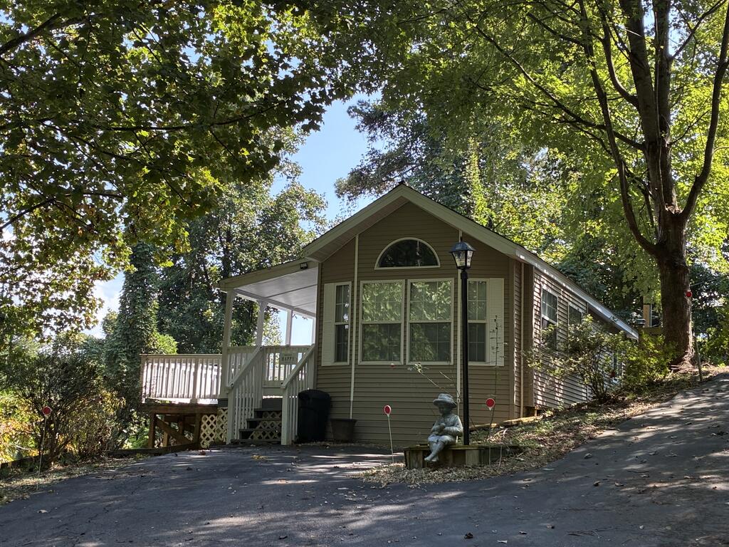 Photo of 48 Homestead Ave, Bryson City, NC 28713 (MLS # 26048547)