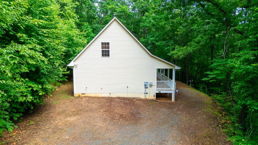 Photo of 419 Bayberry Cove Road, Sylva, NC 28779 (MLS # 26041648)