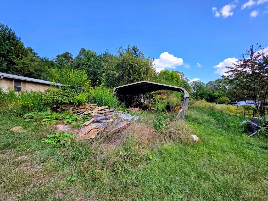 Photo of 318 Moose Branch Rd, Robbinsville (Graham), NC 28771 (MLS # 26042315)