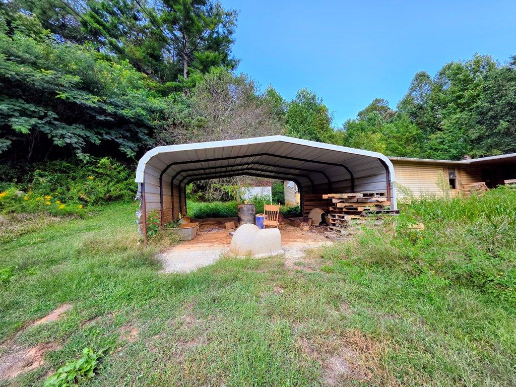 Photo of 318 Moose Branch Rd, Robbinsville (Graham), NC 28771 (MLS # 26042315)