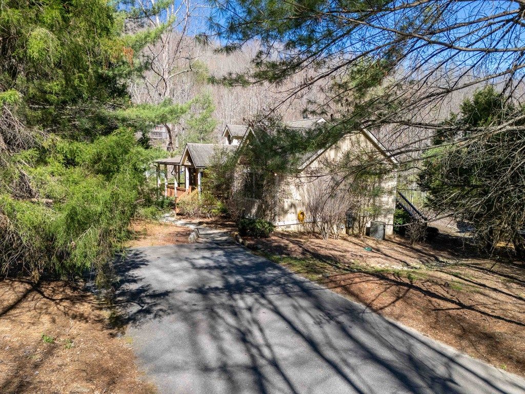 Photo of 98 Mill Pond Dr, Tuckasegee, NC 28783 (MLS # 26046845)