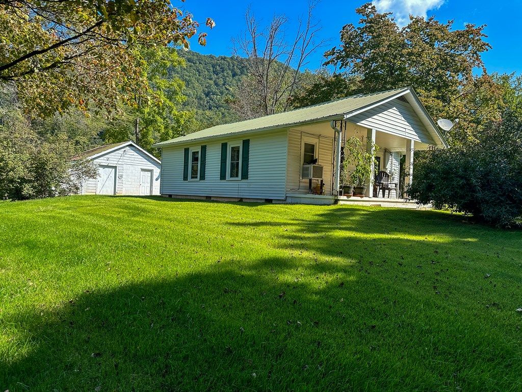 Photo of 241 Canada Rd, Tuckasegee, NC 28783 (MLS # 26042124)