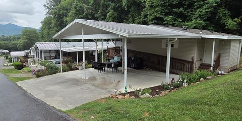 Photo of 210 Country Woods Drive, Franklin, NC 28734 (MLS # 26047508)