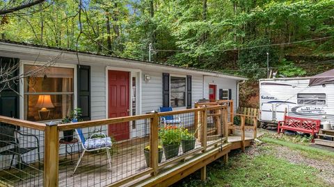 Photo of 74 Cullasaja Hollow Rd, Franklin, NC 28734 (MLS # 26042264) Photo of 74 Cullasaja Hollow Rd, Franklin, NC 28734 (MLS # 26042264)