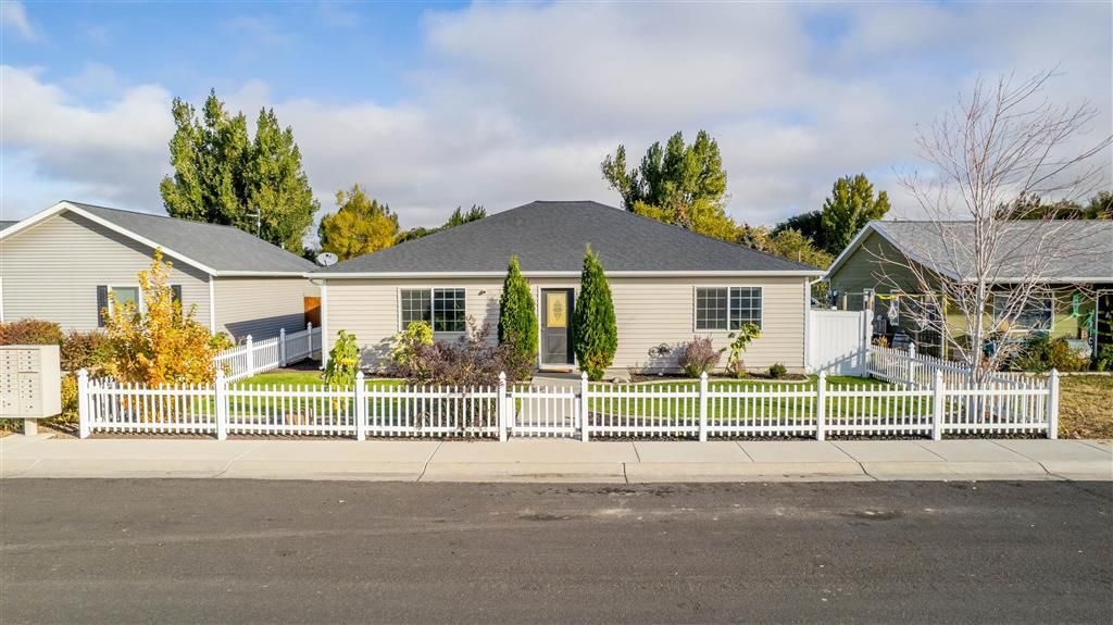 Photo of 1107 E Madison St, Powell, WY 82435 (MLS # 10031777)