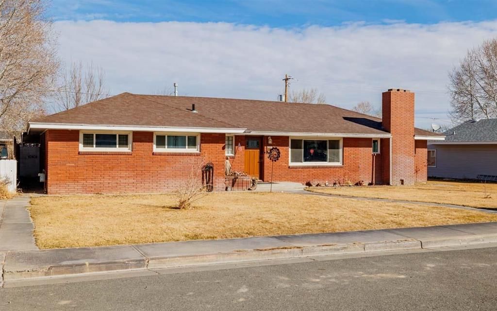 Photo of 309 Carmon Ave, Lovell, WY 82431 (MLS # 10032101)