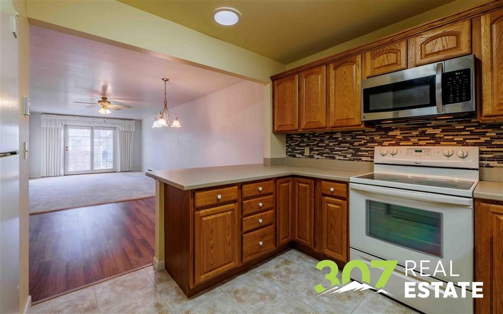 Photo of 966 Avenue G #3, Powell, WY 82435 (MLS # 10031953)