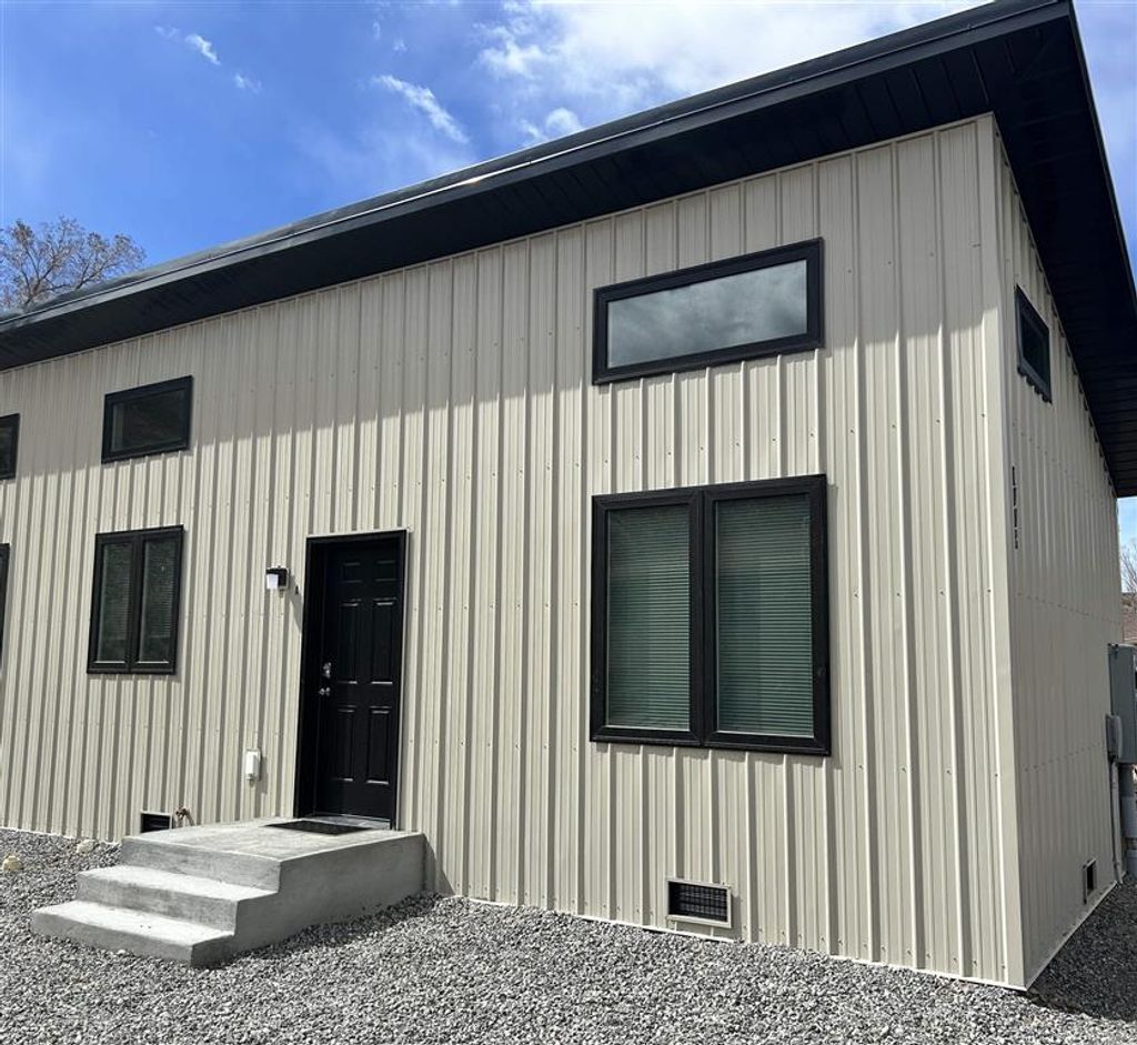 Photo of 1008 Canyon View Ave #B, Cody, WY 82414 (MLS # 10031958)