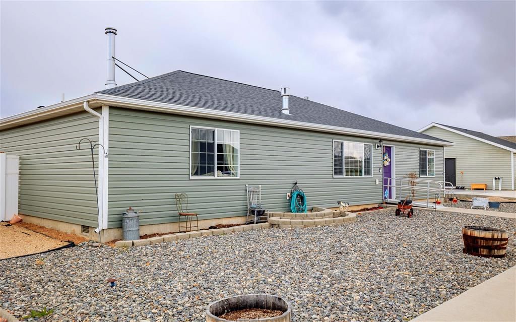 Photo of 1142 E Madison St, Powell, WY 82435 (MLS # 10031562)
