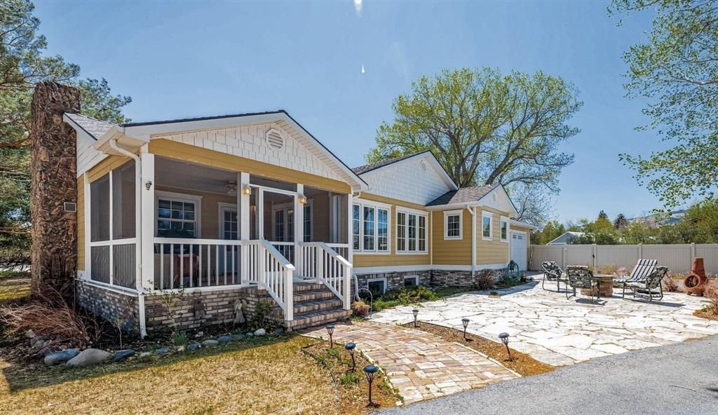 Photo of 1627 11th St, Cody, WY 82414 (MLS # 10032378)