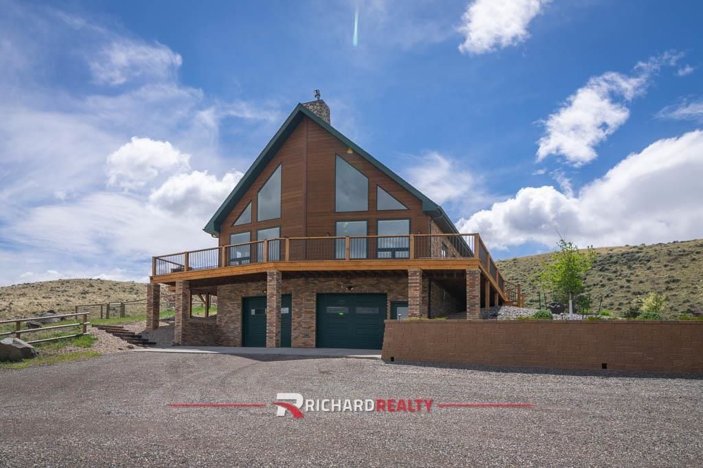Photo of 66 Stagecoach Trl, Cody, WY 82414 (MLS # 10032349)