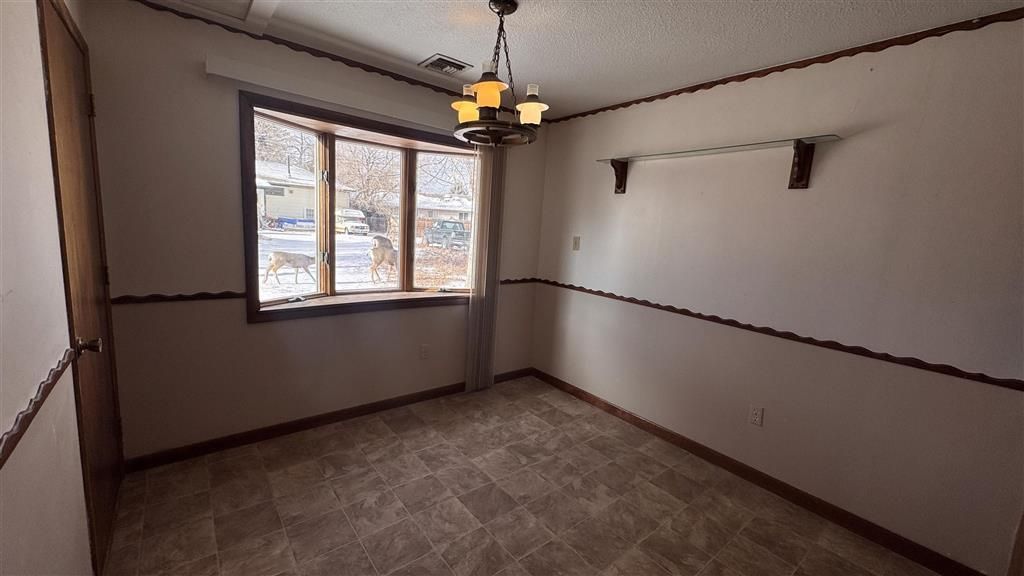 Photo of 1525 19th St, Cody, WY 82414 (MLS # 10031803)