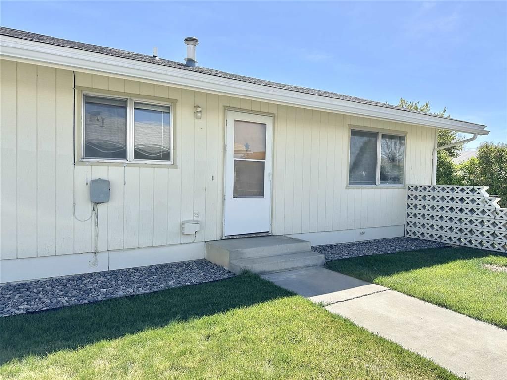 Photo of 716 E 5th St #Apt D, Powell, WY 82435 (MLS # 10032363)