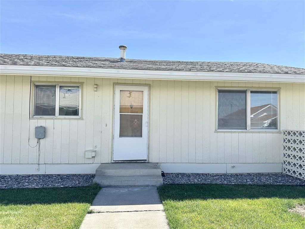 Photo of 716 E 5th St #Apt D, Powell, WY 82435 (MLS # 10032363)