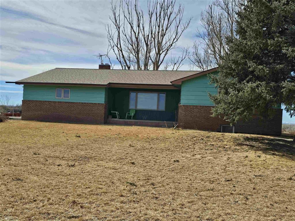 Photo of 1670 Sesame St, Worland, WY 82401 (MLS # 10032150)