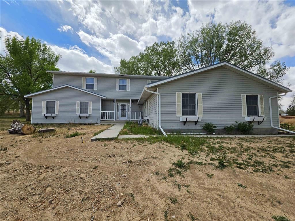 Photo of 1302 Ten Mile Dr, Worland, WY 82401 (MLS # 10032395)