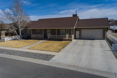 Photo of 926 33rd St, Cody, WY 82414 (MLS # 10032190)