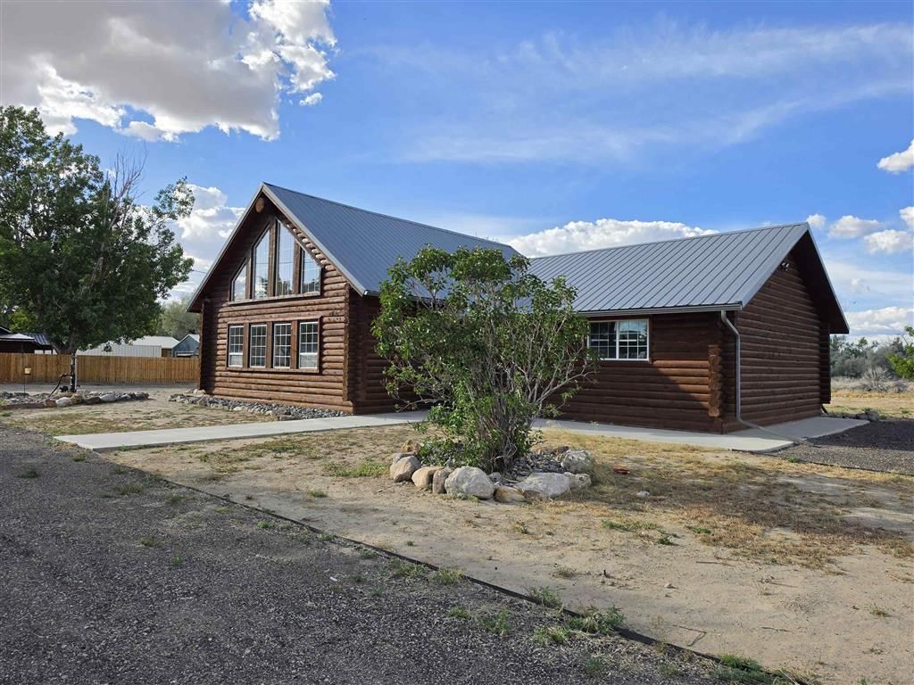 Photo of 311 Bridge Ave, Worland, WY 82401 (MLS # 10032424)