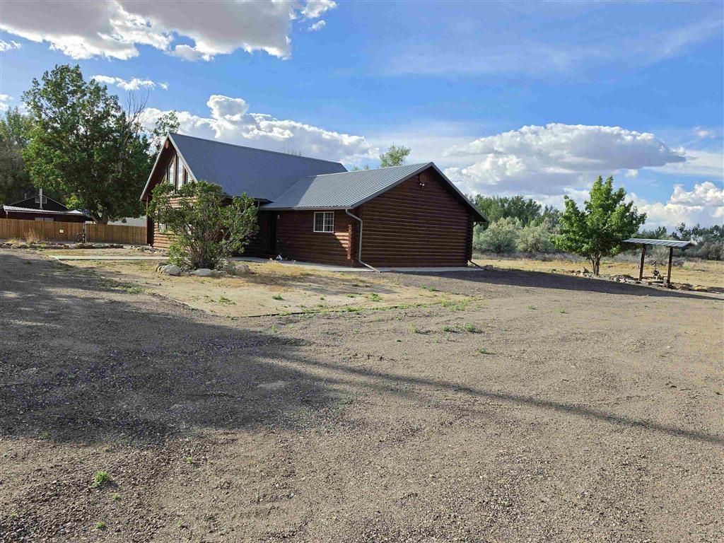 Photo of 311 Bridge Ave, Worland, WY 82401 (MLS # 10032424)