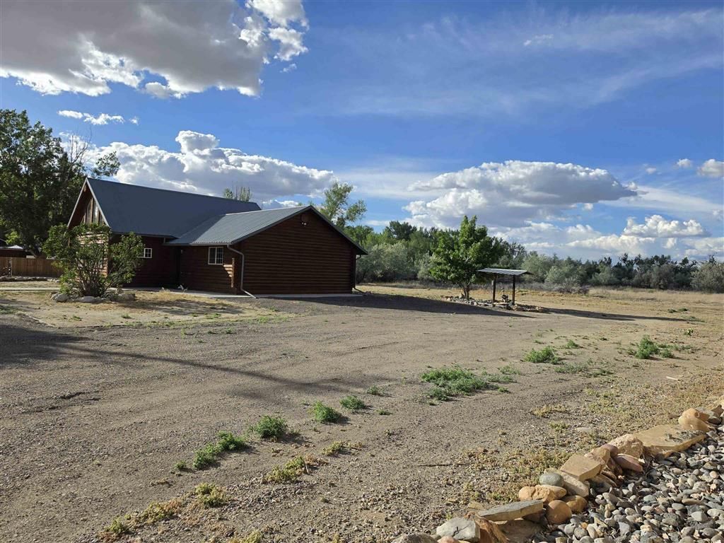 Photo of 311 Bridge Ave, Worland, WY 82401 (MLS # 10032424)
