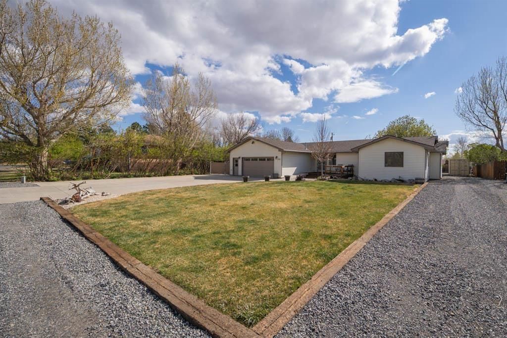 Photo of 2202 Southfork St, Cody, WY 82414 (MLS # 10032310)