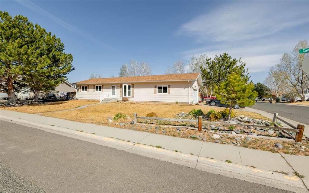 Photo of 719 Canyon View Ave, Cody, WY 82414 (MLS # 10032264)