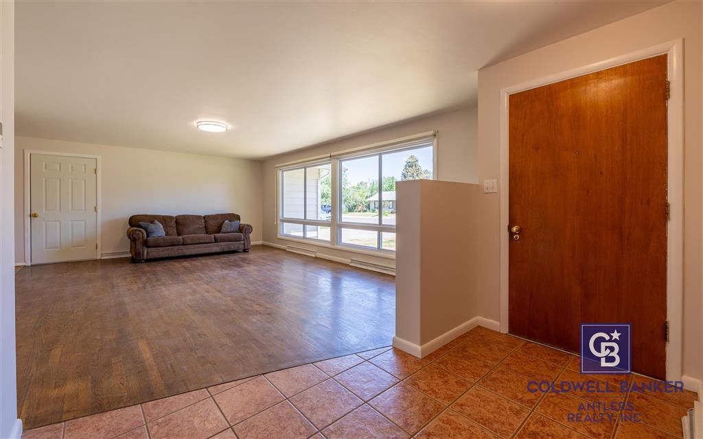 Photo of 1507 26th St, Cody, WY 82414 (MLS # 10031448)