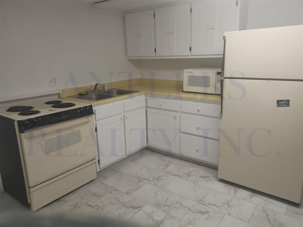 Photo of 821.5 13th St, Cody, WY 82414 (MLS # 10032255)