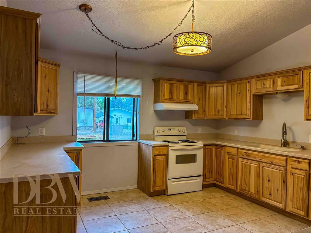 Photo of 217 8th Ave N Ave, Greybull, WY 82426 (MLS # 10031361)