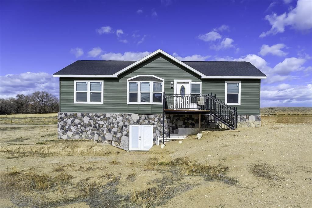 Photo of 1099 Road 14, Powell, WY 82435 (MLS # 10031101)