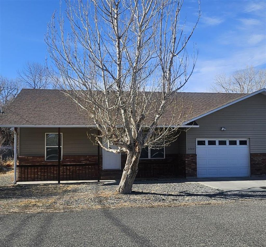 Photo of 1747 26th St, Cody, WY 82414 (MLS # 10032046)