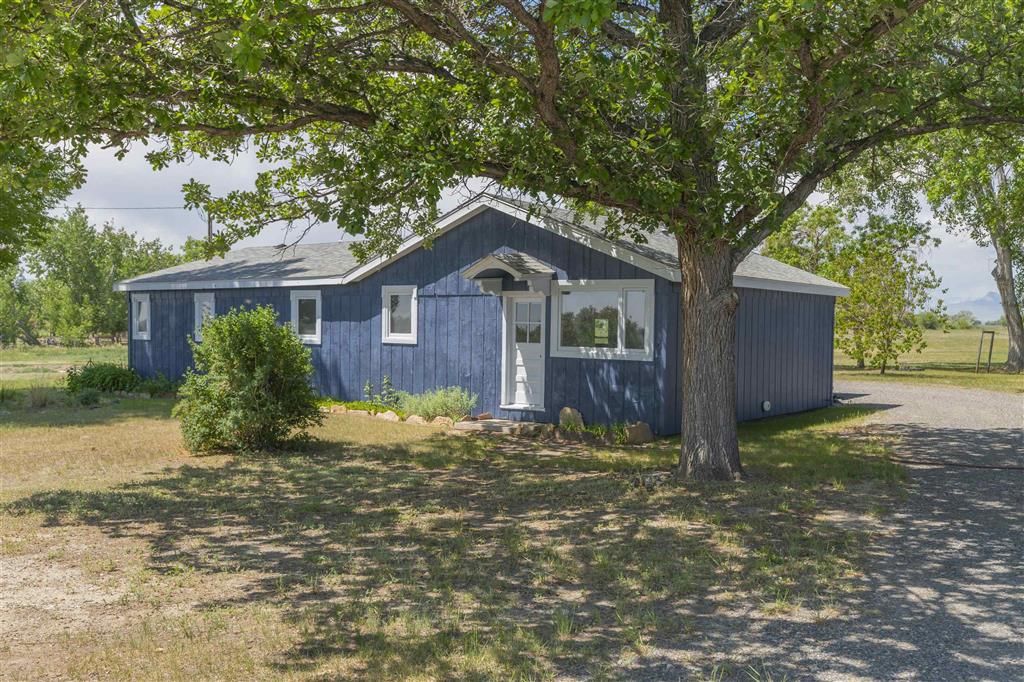 Photo of 1120 Road 9, Powell, WY 82435 (MLS # 10031963)
