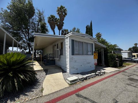 Photo of 22111 Newport Ave Spc 157 AVE, Grand Terrace MHP, CA 92313 (MLS # 11780731)