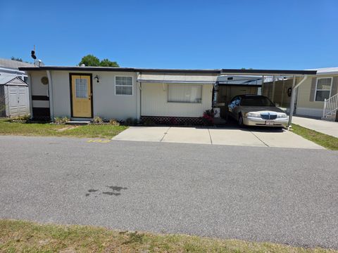 Photo of 34601 Leisure Days Dr, Zephyrhills, FL 33541 (MLS # 11740670)