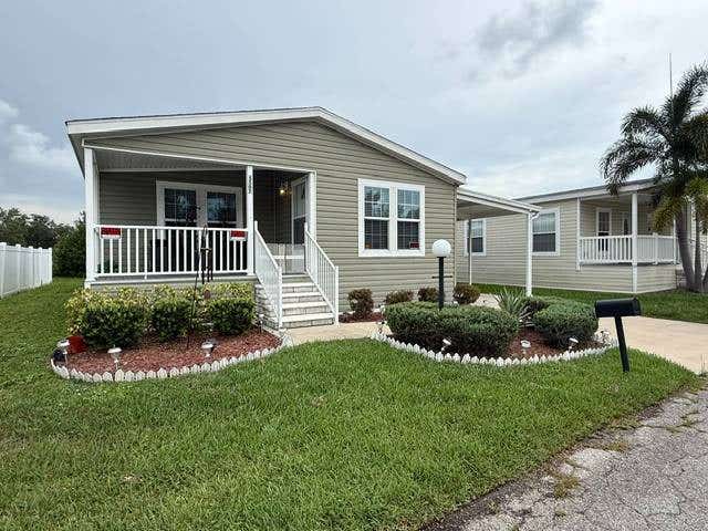 Photo of 5507 Whistling Tree Lane, Bradenton, FL 34203 (MLS # 11920893)