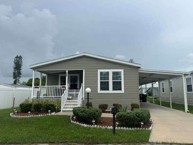 Photo of 5507 Whistling Tree Lane, Bradenton, FL 34203 (MLS # 11920893)