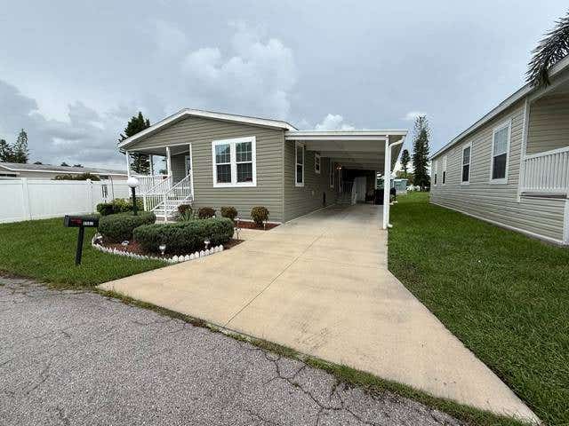 Photo of 5507 Whistling Tree Lane, Bradenton, FL 34203 (MLS # 11920893)