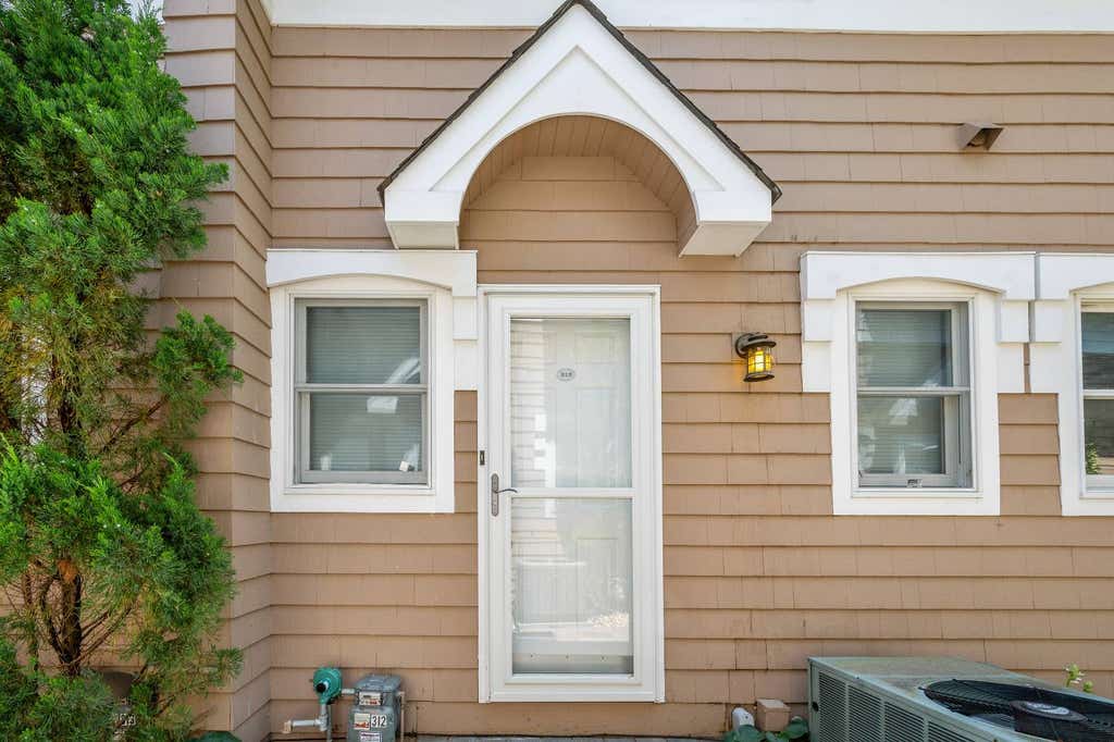 Photo of 49 Canoe Place #312, Hampton Bays, NY 11946 (MLS # 11927215)