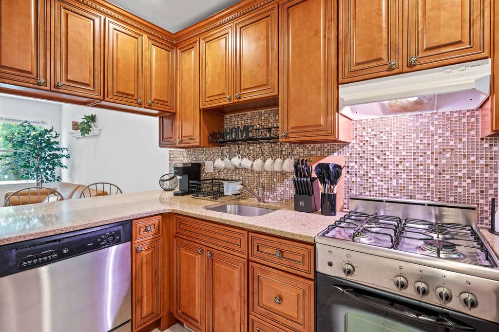 Photo of 49 Canoe Place #312, Hampton Bays, NY 11946 (MLS # 11927215)